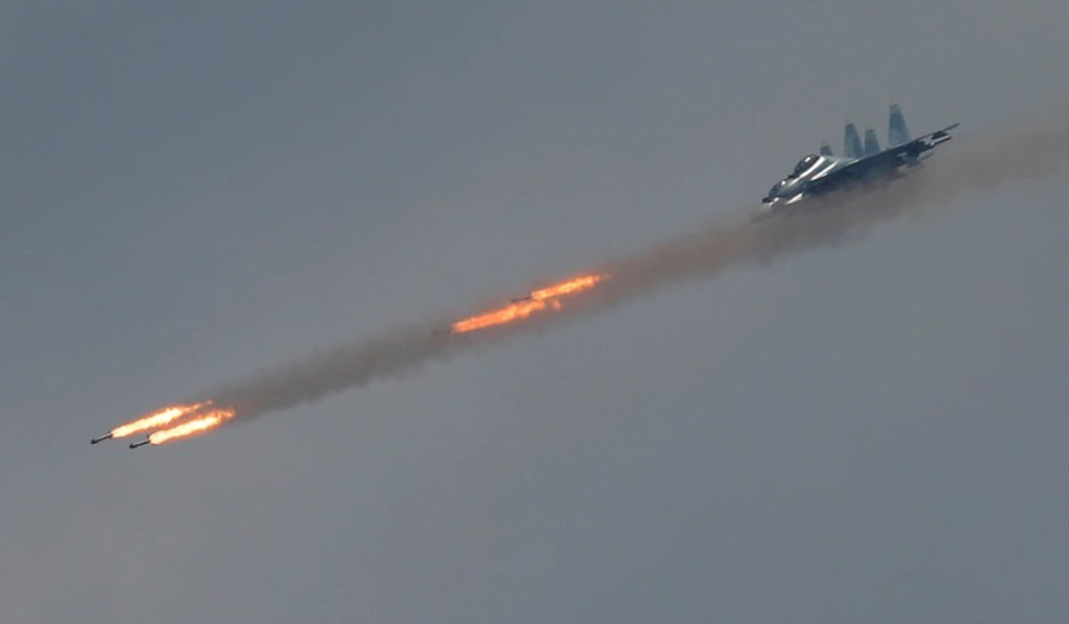 A Sukhoi Su-30 SM jet fighter fires missiles